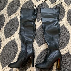 Thigh high black boots